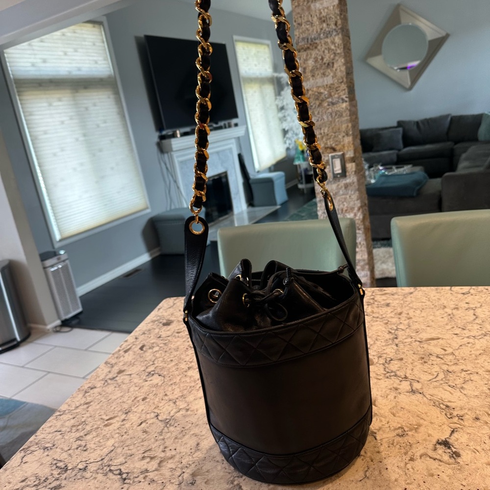 CHANEL Vintage Black Lambskin Hobo Bucket Bag w/ gold chain strap.